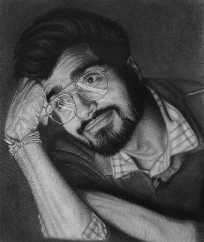 Pencil sketch man with glasses lying pose by Sumit Kumar sketch artist Patna Bihar